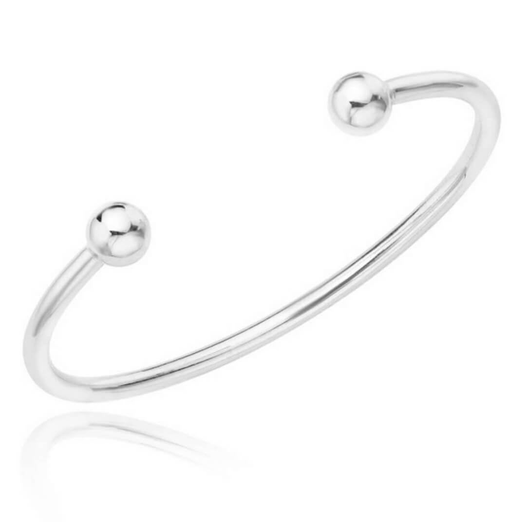 White gold hot sale torque bangle